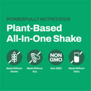 Vitasave protein shake tub surrounded by superfoods, leafy greens, and chocolate chunks