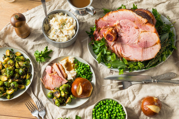 Healthy holiday meal with colorful vegetables and lean proteins on a festive table.
