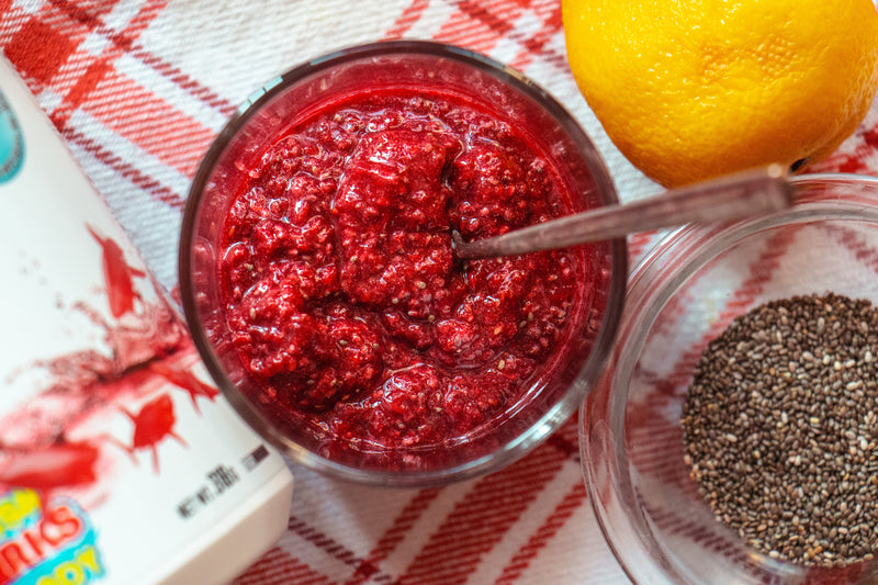 Colorful summer recipe spread featuring refreshing smoothies, vibrant salads, and protein-packed dishes made with Perfect Sports products, styled on a sunny outdoor table.
