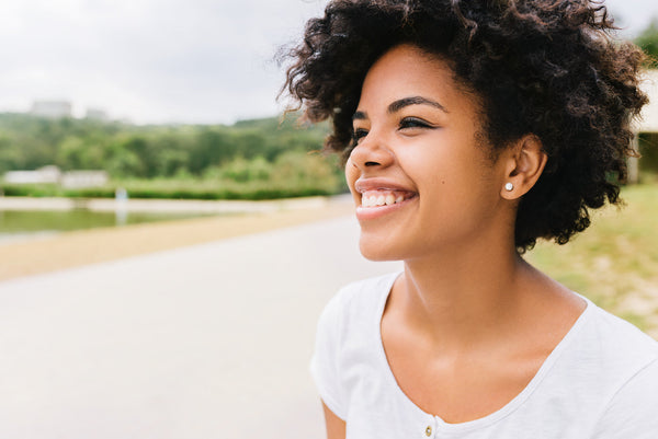 Two-step skin care routine with New Roots products, featuring gentle cleanser and nourishing moisturizer for healthy, radiant skin