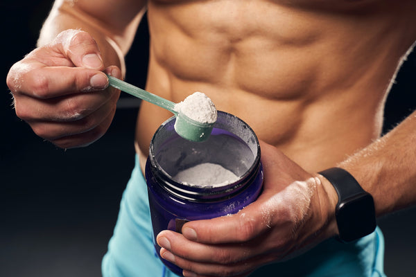Various natural supplements and protein powders arranged on a table for healthy weight gain support
