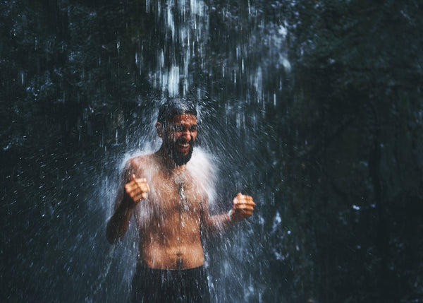 Refreshing cold shower promoting mental clarity and improved mood for overall wellness.
