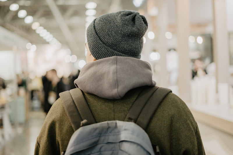 Traveler packing essential wellness supplements for a holiday trip.