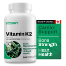 A bottle of Vitasave Vitamin K2 supplement and a packaging label indicating the product is for bone and heart health, with a concentration of 120 mcg per capsule.