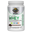 A container of Garden of Life Sport Certified Grass Fed Whey protein powder in chocolate flavor.