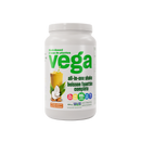Vega All in One Nutritional Shake bottle with Coconut Almond flavor, surrounded by coconut halves and almonds.