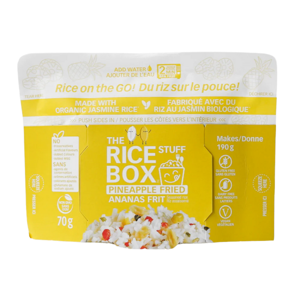 Packaged rice product in a yellow box labeled 'The Rice Stuff' with 'Pineapple Fried Rice' and a picture of the rice product.