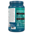 Vega All in One Nutritional Shake - Vanilla Chai (874 g) next to a glass of freshly mixed shake.