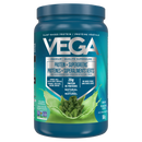 Blue container of Vega protein powder with green leaf design on a white background