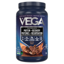 Vega Sport Protein Mocha mixed in a shaker bottle: The protein shake, blended with almond milk, exhibits a creamy mocha color, demonstrating its easy mixability and smooth consistency.