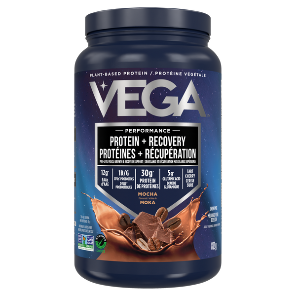 Vega Sport Protein Mocha mixed in a shaker bottle: The protein shake, blended with almond milk, exhibits a creamy mocha color, demonstrating its easy mixability and smooth consistency.