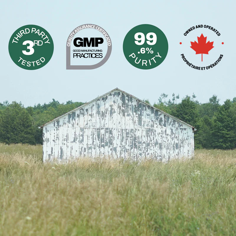 White barn in a field with certification logos on a blue background