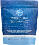 Aqua Miraculorum Methylene Blue Age Defying Bath – a luxurious blue bath soak in a glass jar, designed to promote youthful skin, rejuvenation, and cellular renewal through antioxidant-rich methylene blue.