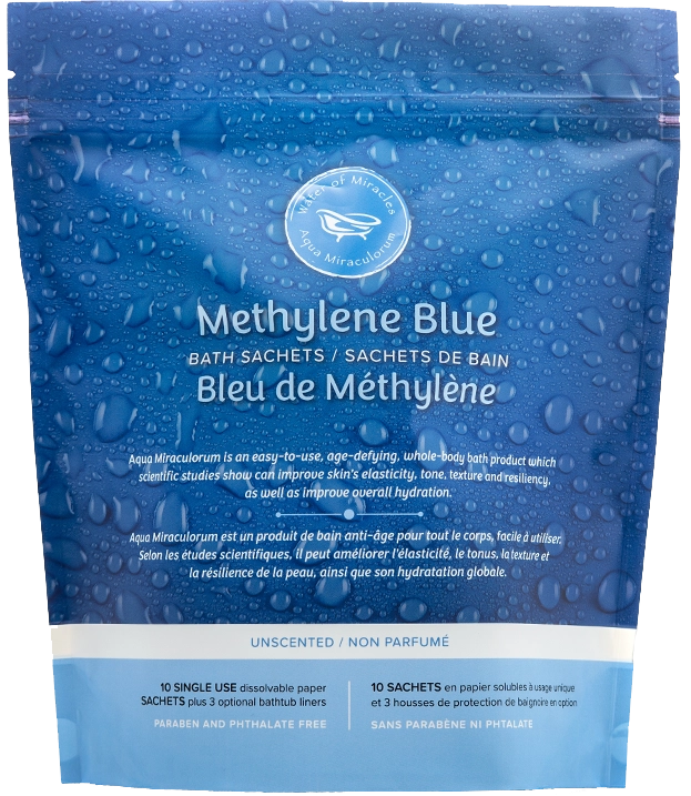 Aqua Miraculorum Methylene Blue Age Defying Bath – a luxurious blue bath soak in a glass jar, designed to promote youthful skin, rejuvenation, and cellular renewal through antioxidant-rich methylene blue.