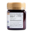 Flora Manuka Honey jar with 515+ MGO and 15+ UMF rating, showcasing New Zealand origin and raw, unpasteurized quality.