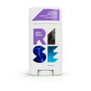 Two sticks of natural deodorant from the brand Rise, one with a purple cap and one with a white cap. The packaging promotes the product as being aluminum-free, paraben-free, and cruelty-free.